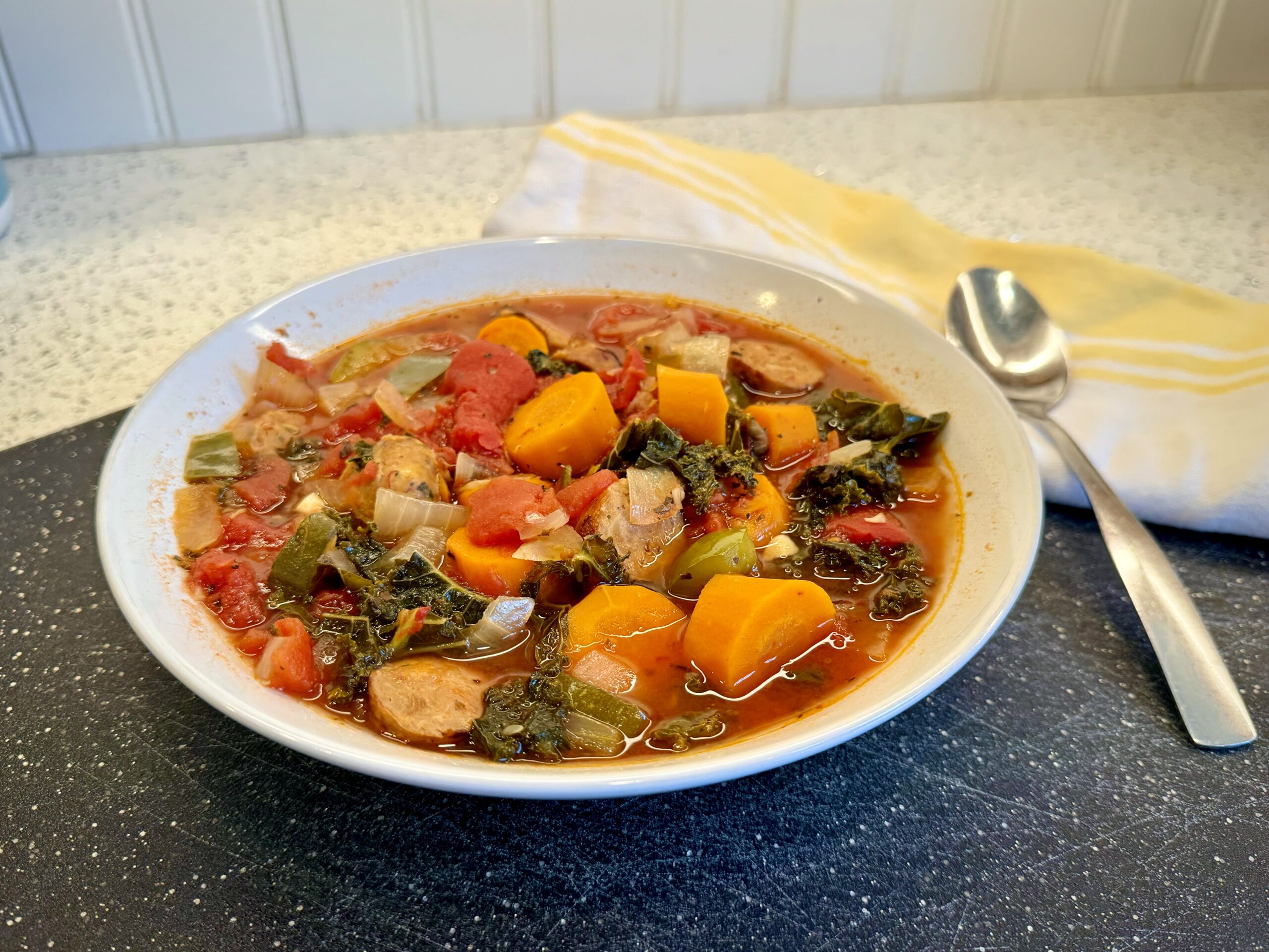 Hearty Tomato and Chicken Sausage Stew with Kale in the Crock Pot